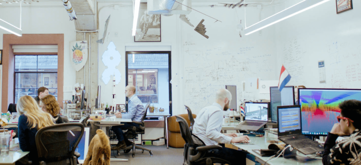 Lineage Data Science team collaboratively working on Lineage Eye in the bustling San Francisco office.